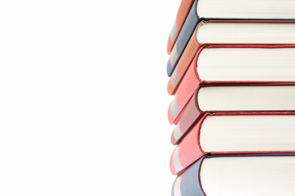 a picture of books stacked over each other
