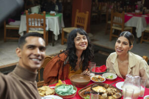 adults enjoying a food