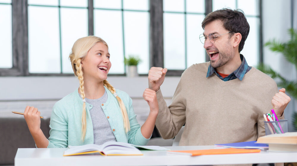 two young people in class