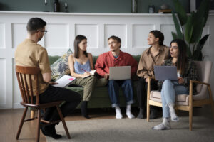 gather of people having conversation