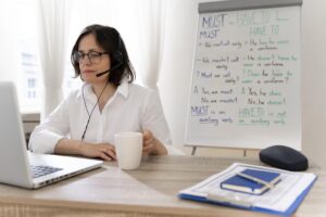 English teacher doing her lessons online at home