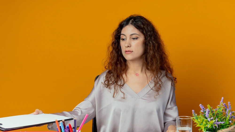 A lady with some book and file