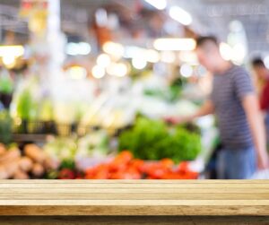 blurry picture of a guy grocery shopping