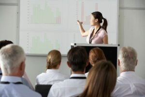 Woman speaking to an audience